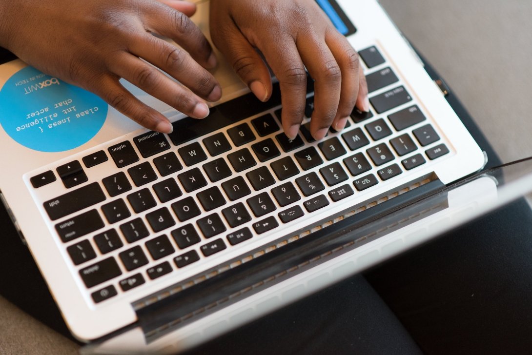 Woman typing on laptop