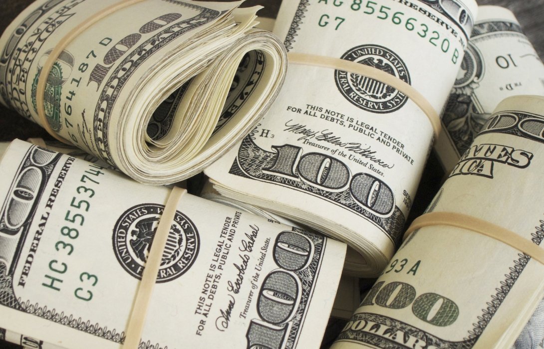 Wads of $100 bills