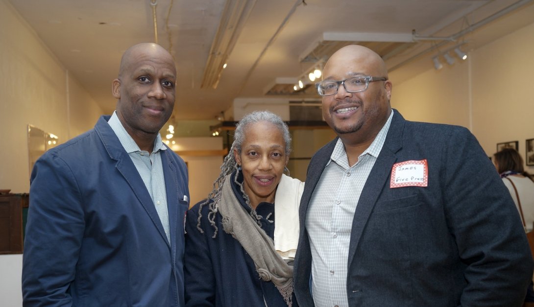 Free Press Organizer James L. Thompson (right) with two Newark residents