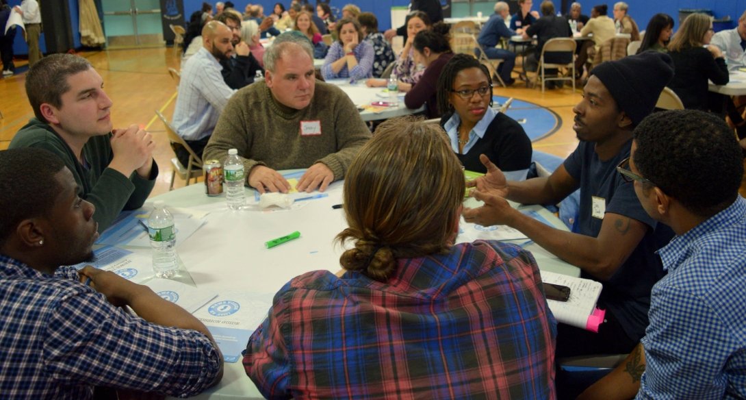 People talking around a table