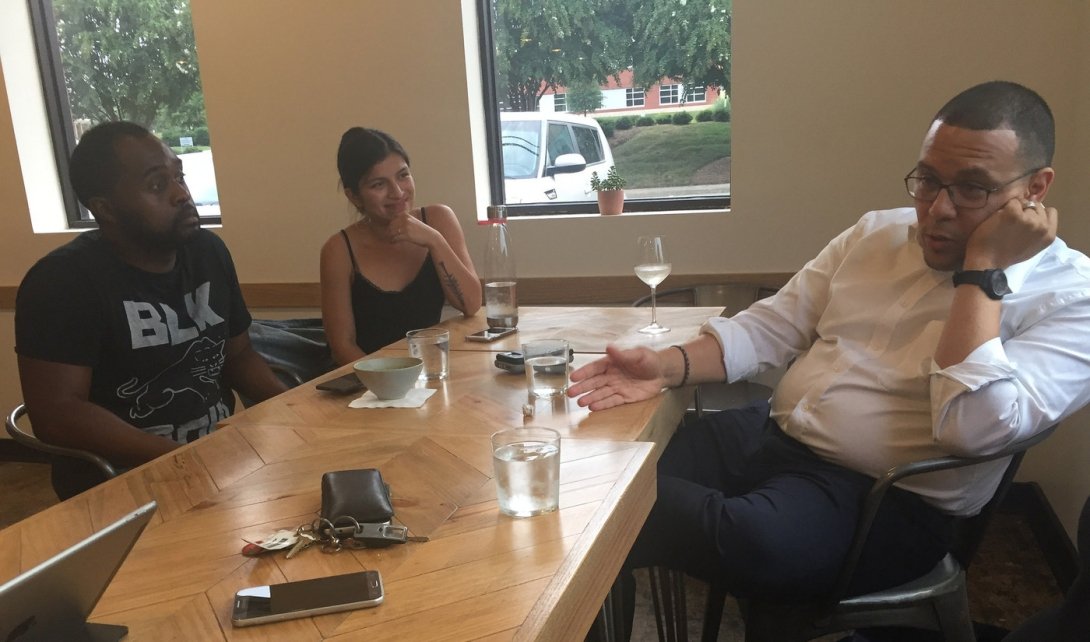 A Charlotte Observer journalist talks to community residents