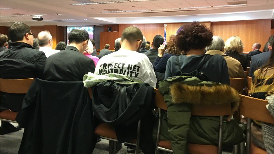 Activist wearing protect Net Neutrality T-shirt