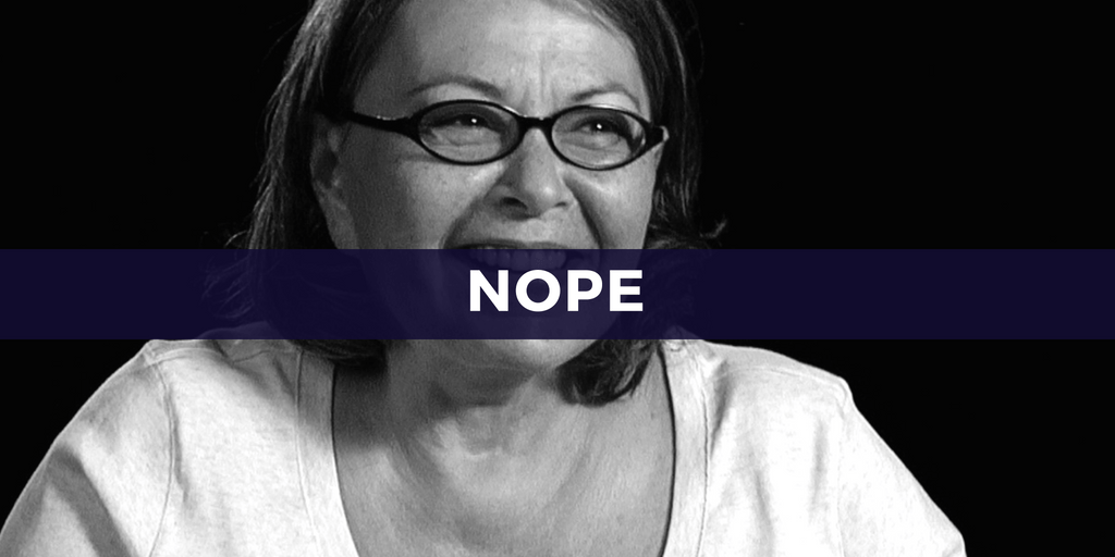 Roseanne Barr with the word "nope" over her mouth