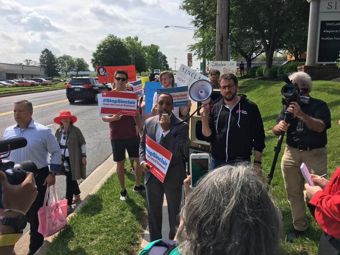 Activists gather outside the Sinclair Broadcast Groups Shareholder meeting for a Rally to stop the Sinclair-Tribune merger.