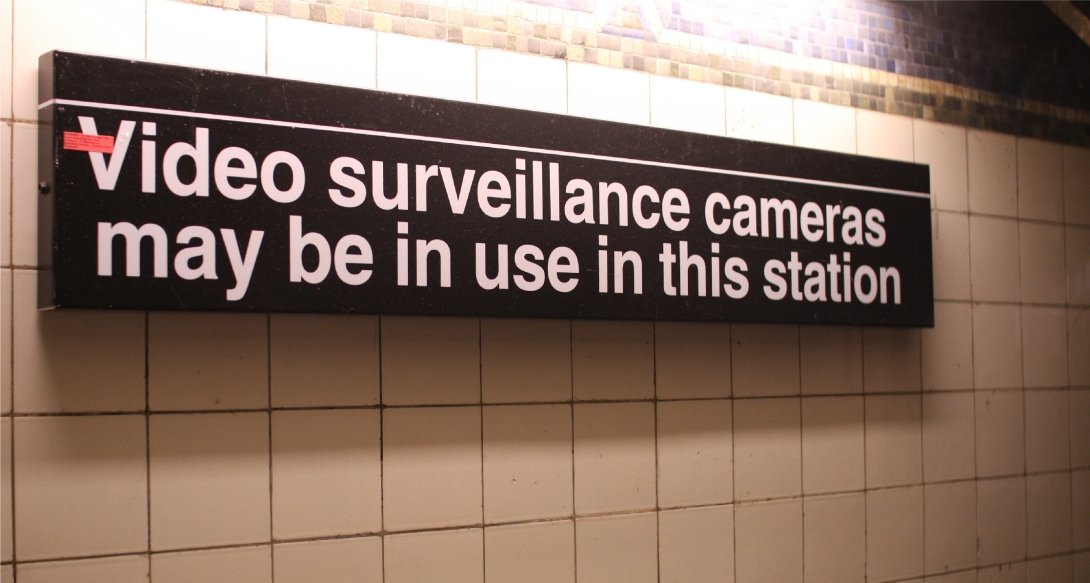 Subway surveillance sign
