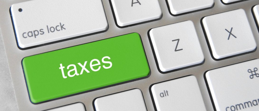 Keyboard with a key marked "Taxes"