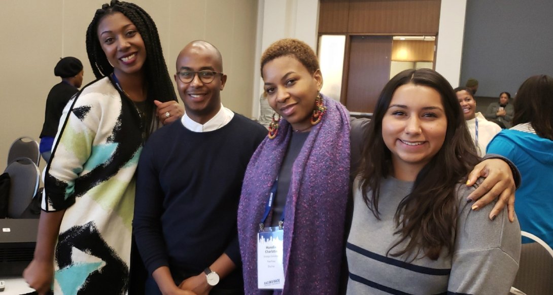 Three Free Press staffers with an ally