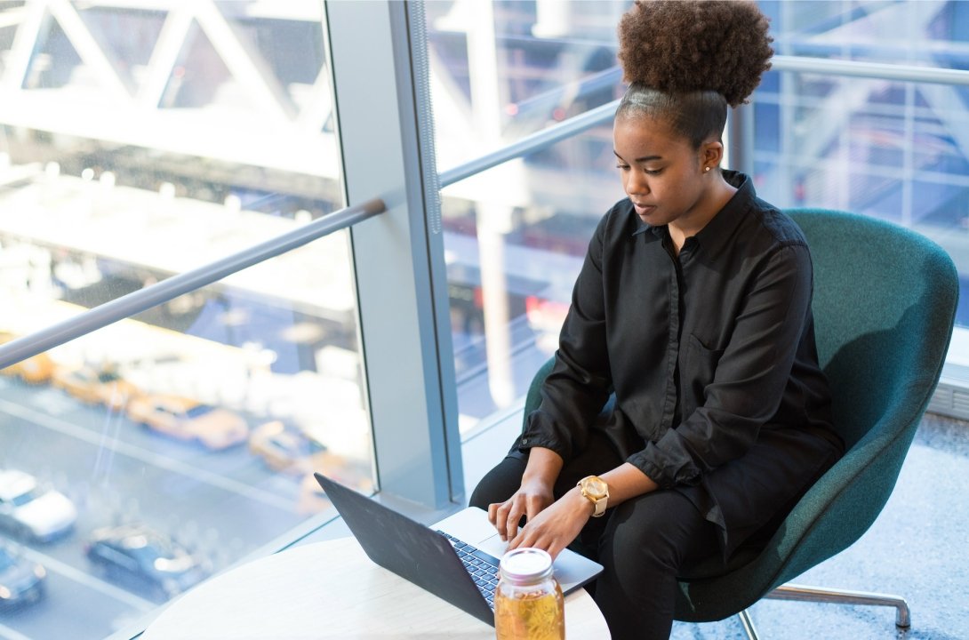 Woman typing on laptop